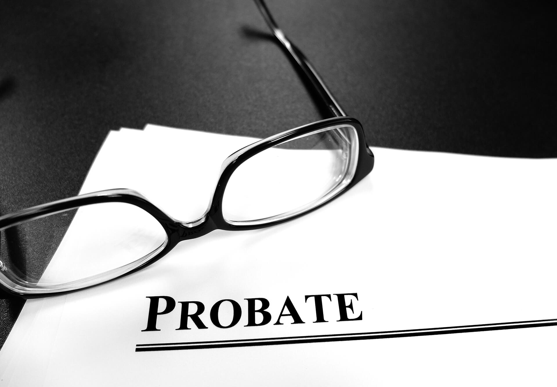 Some black spectacles and a probate letter