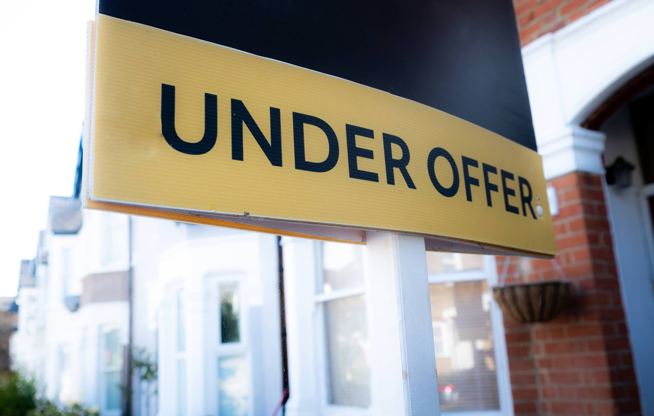 Under offer sign outside a house