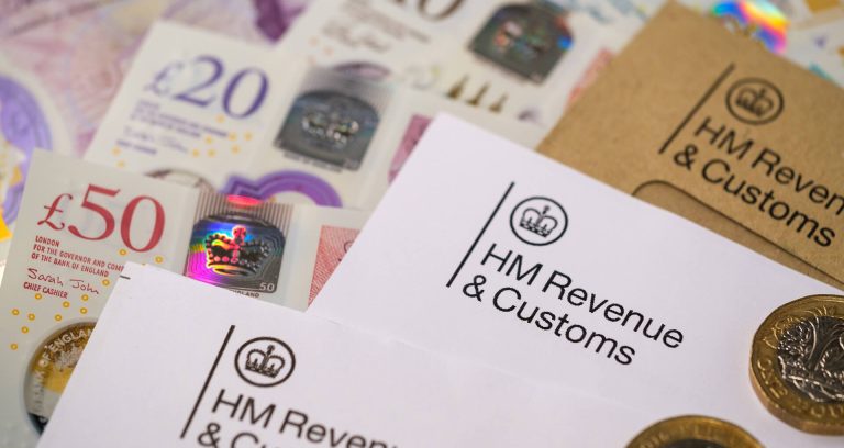 English banknotes and coins and letters from HM Revenue & Customs