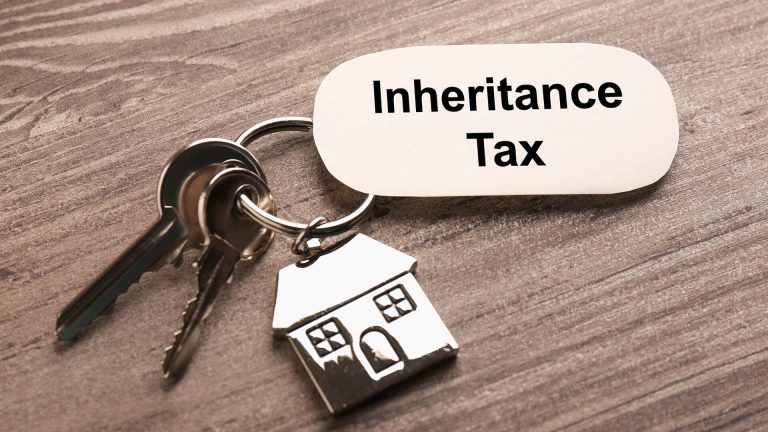 Inheritance Tax Card and House Keyring with a bunch of keys