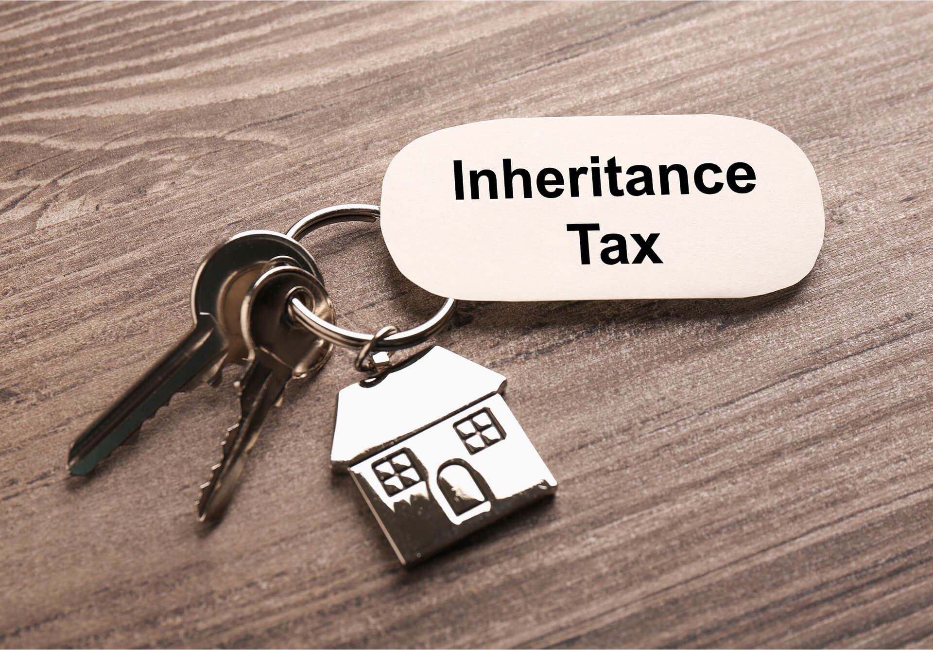 Inheritance Tax Card and House Keyring with a bunch of keys